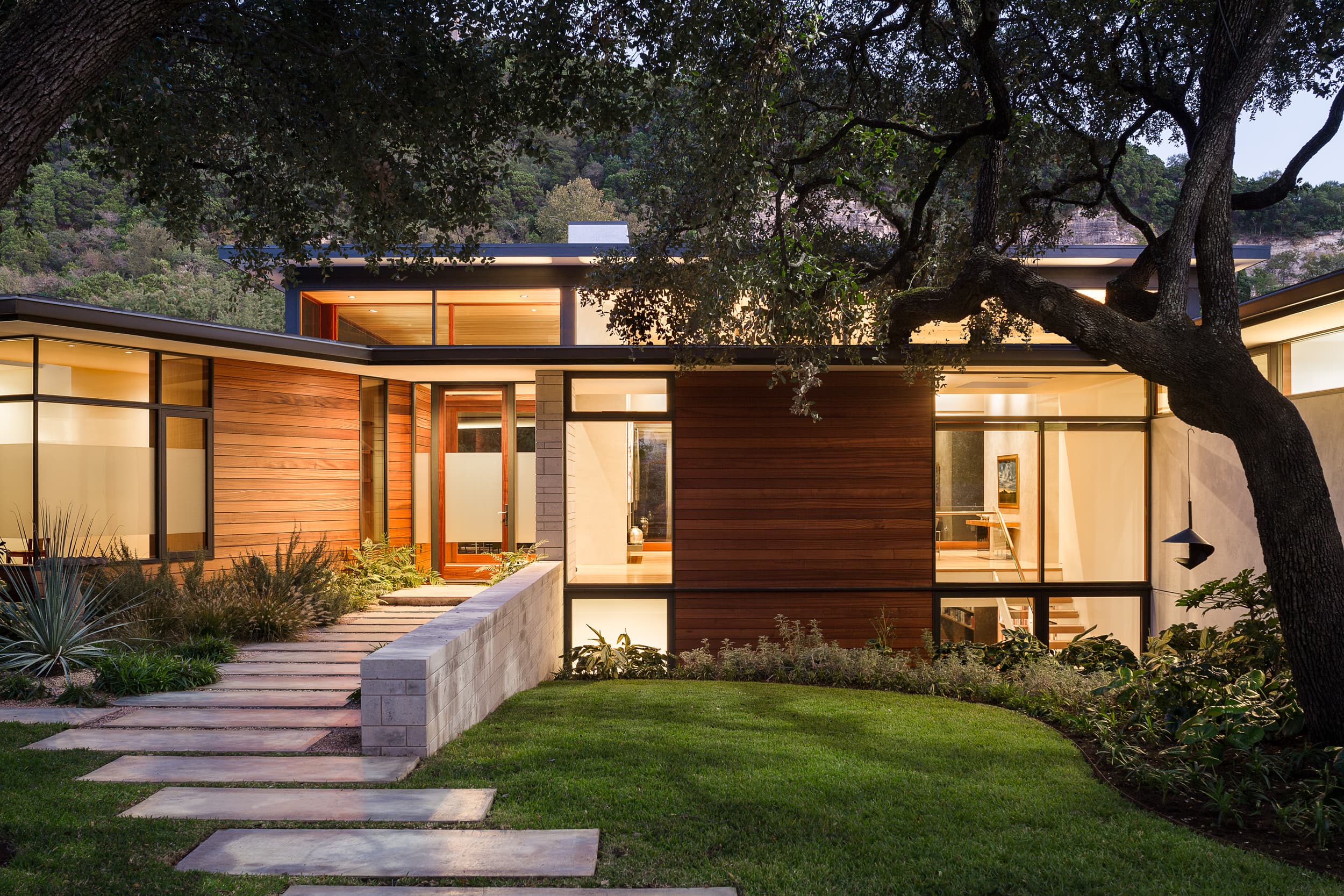Radial House - Front Entry Evening; A Parallel Architecture