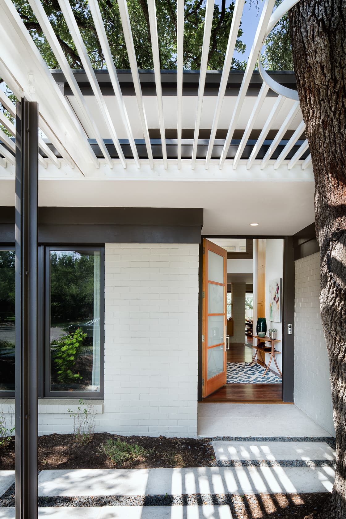 Three Courts Residence - Front Door; A Parallel Architecture