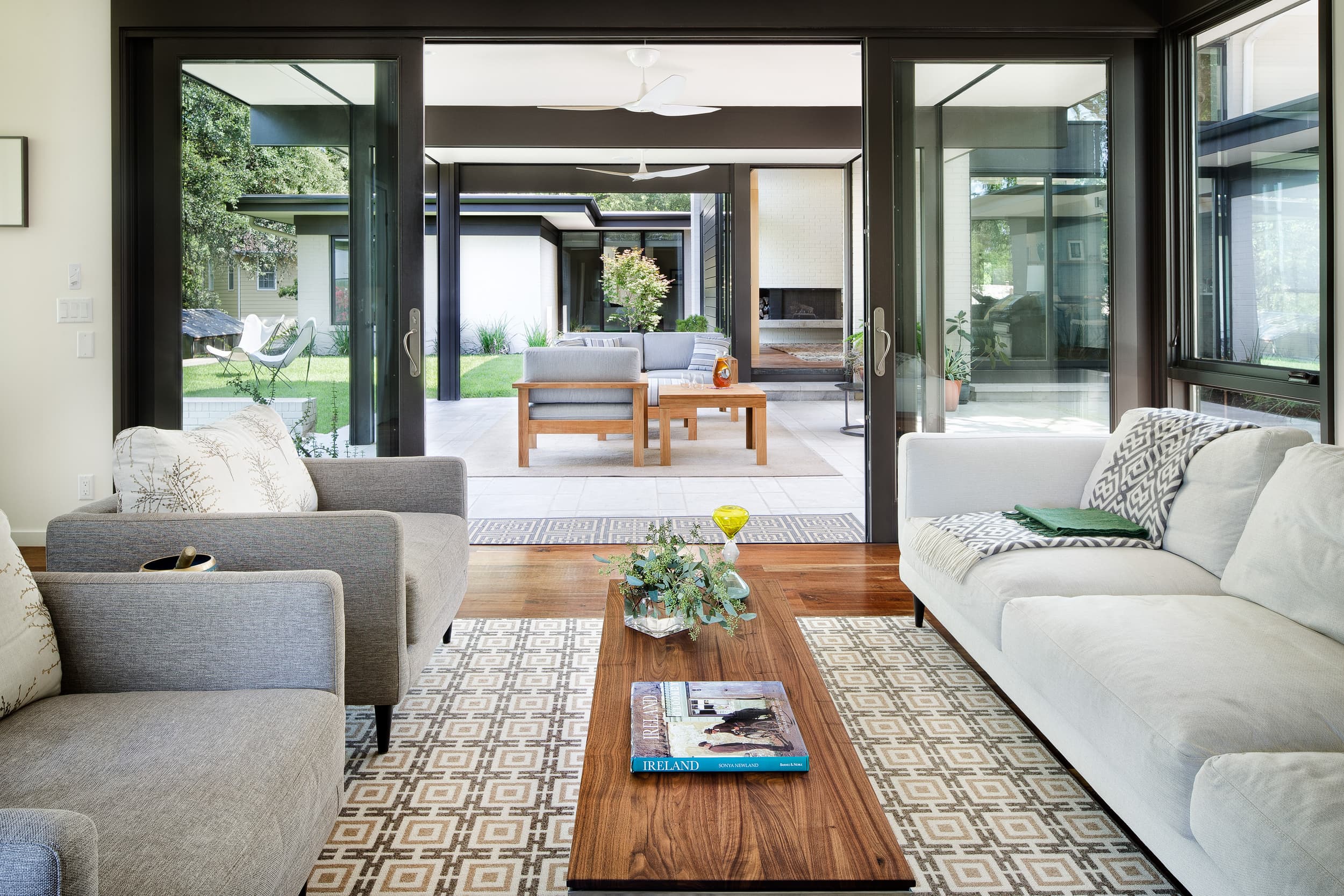 Three Courts Residence - Living room to Patio; A Parallel Architecture