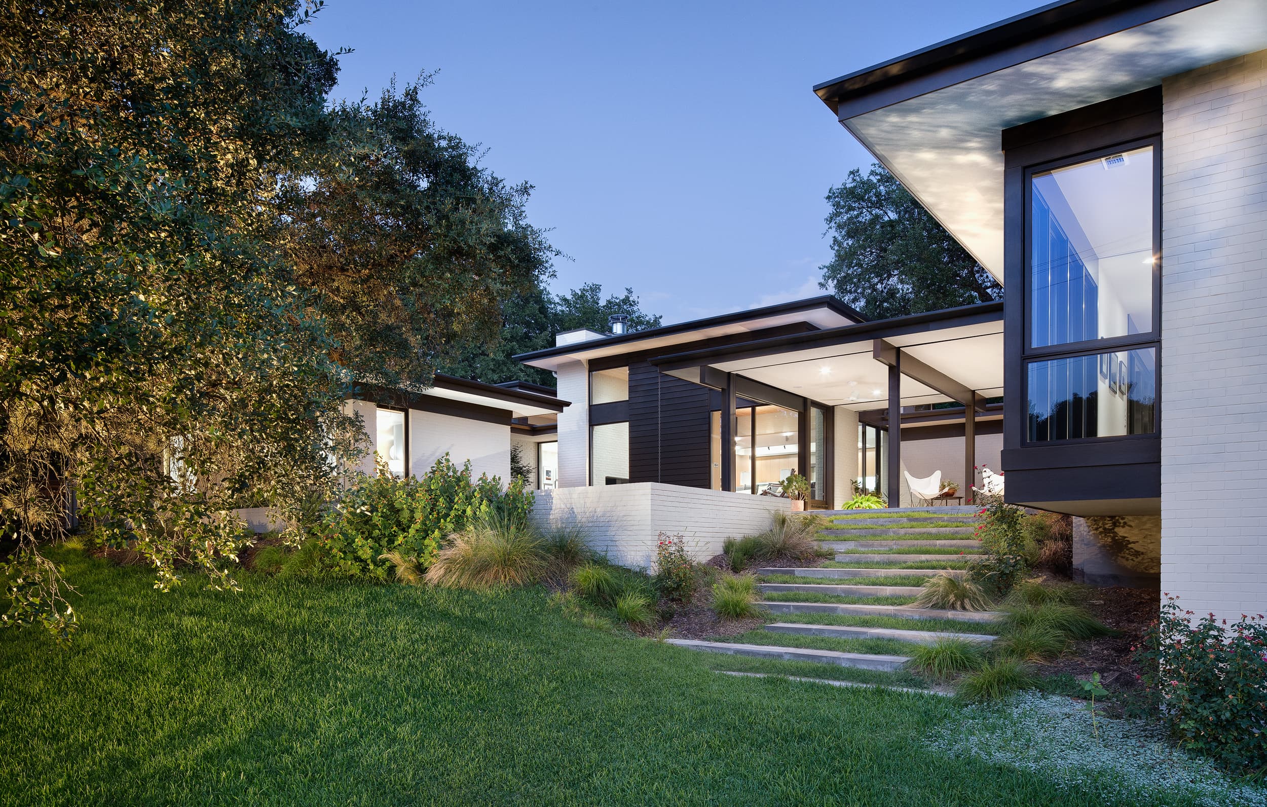 Three Courts Residence - Backyard towards house; A Parallel Architecture