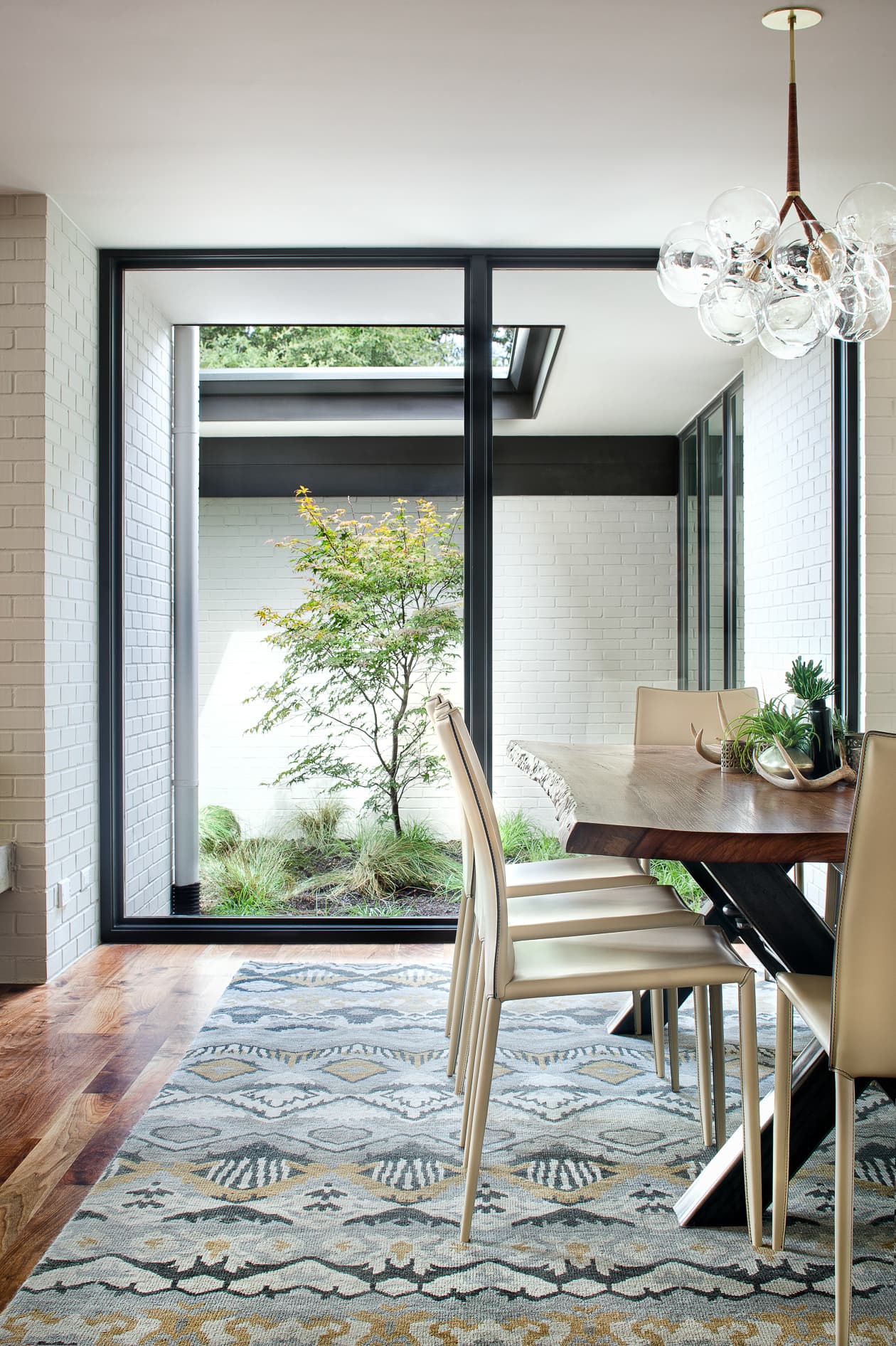 Three Courts Residence - Dining Room to Courtyard; A Parallel Architecture