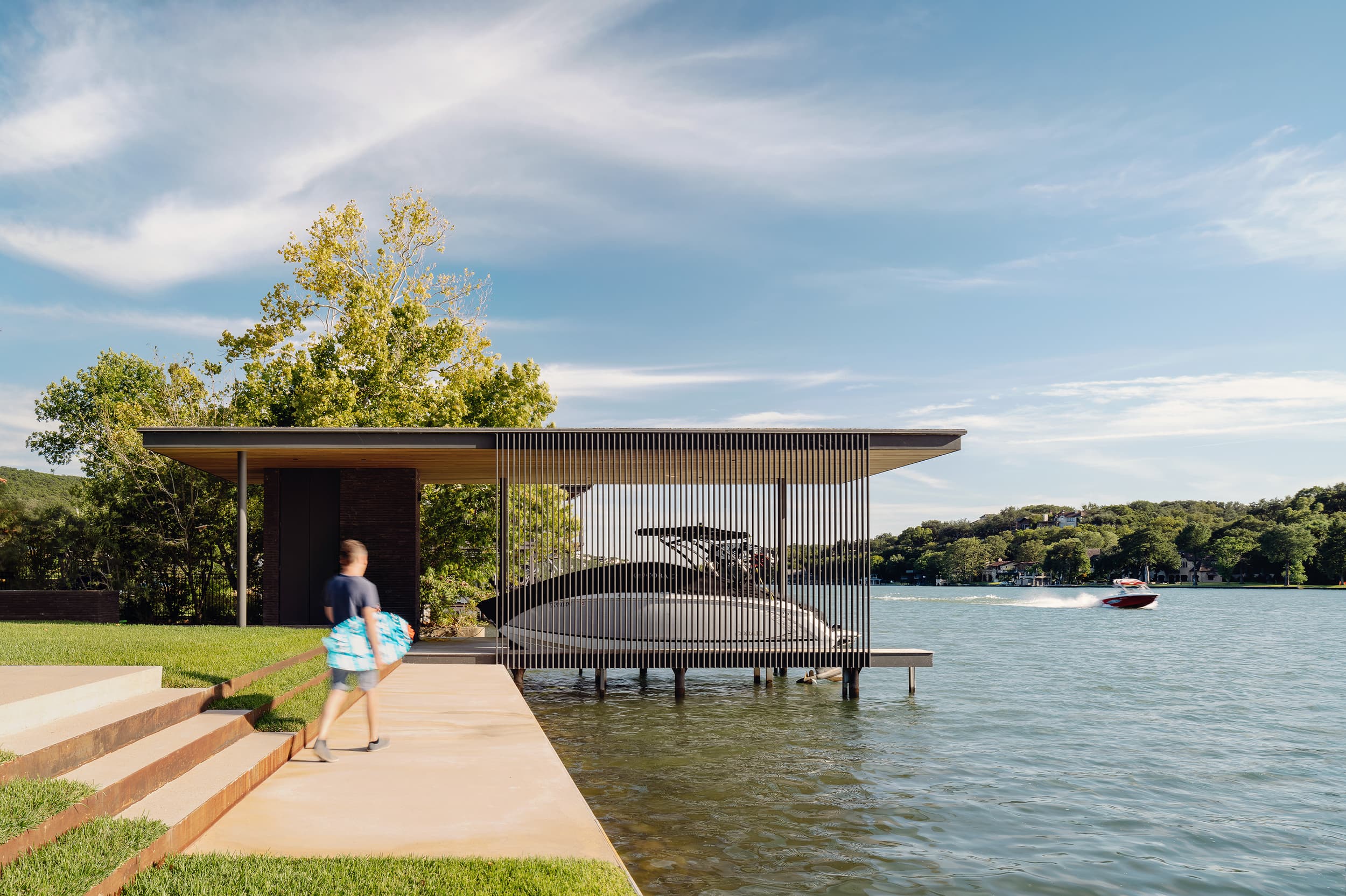Water's Edge Residence - Modern covered boat dock; A Parallel Architecture